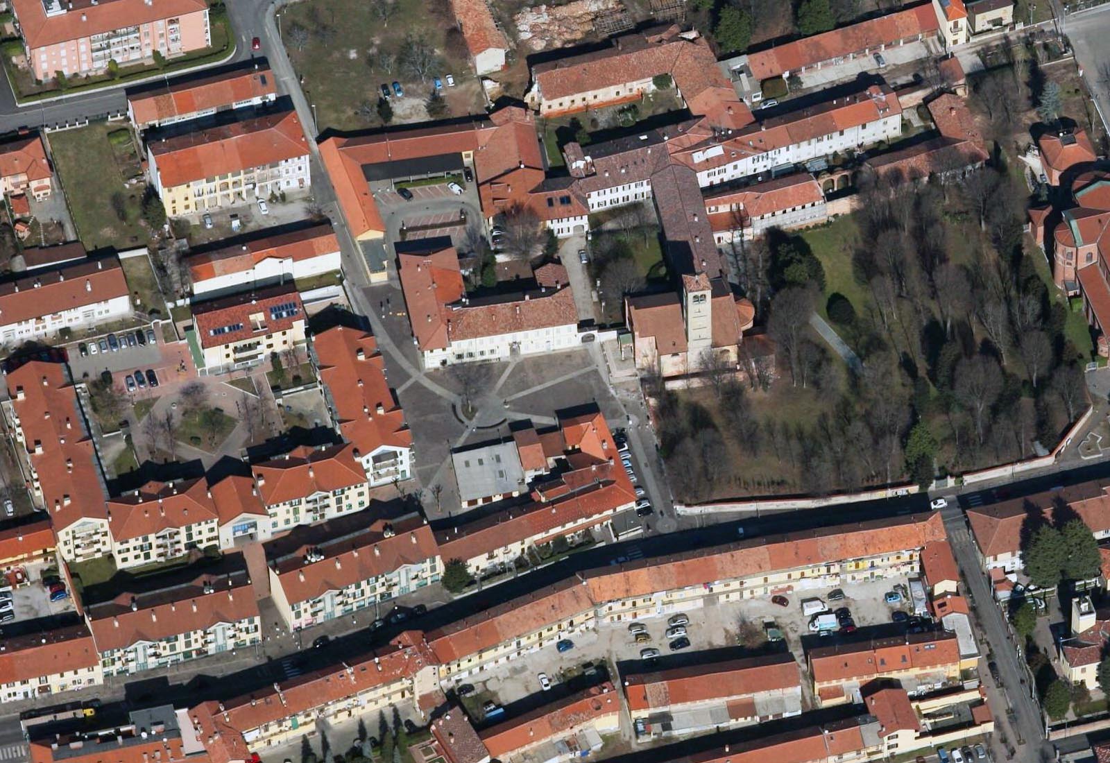 Square in front of the old church of S. Pietro all'Olmo in Cornaredo - Aerial view