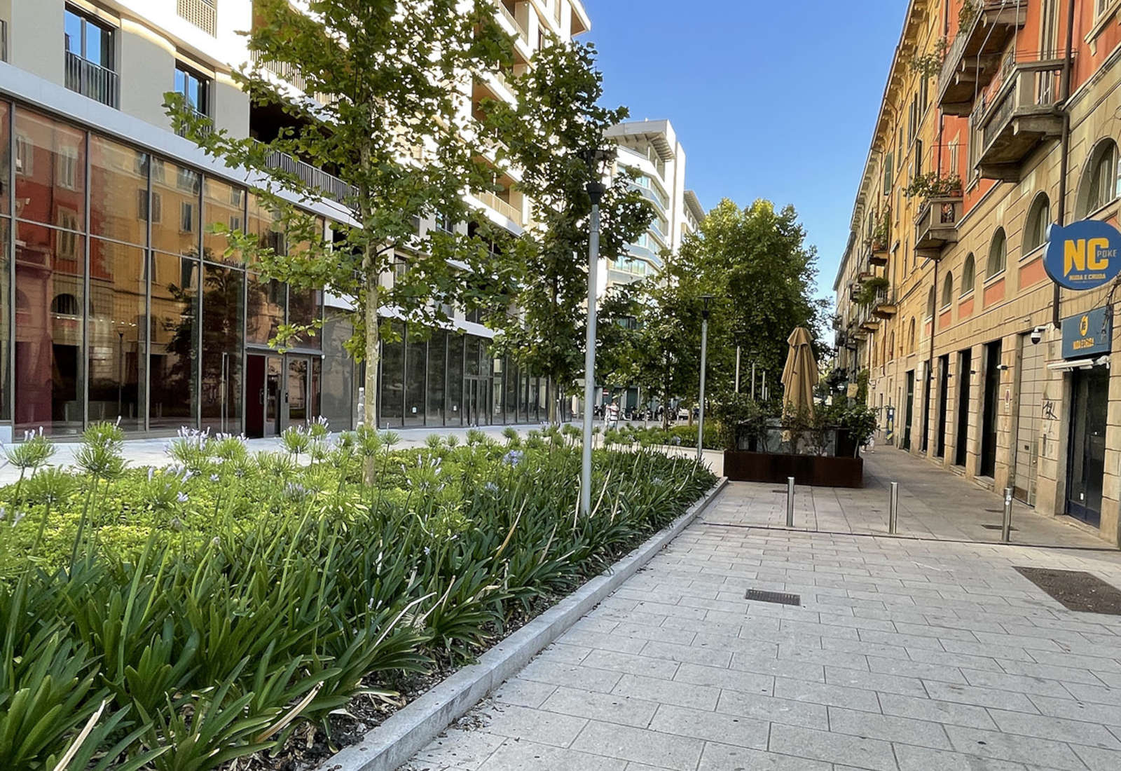 Vespucci street and Principessa Clotilde square in Milan - View