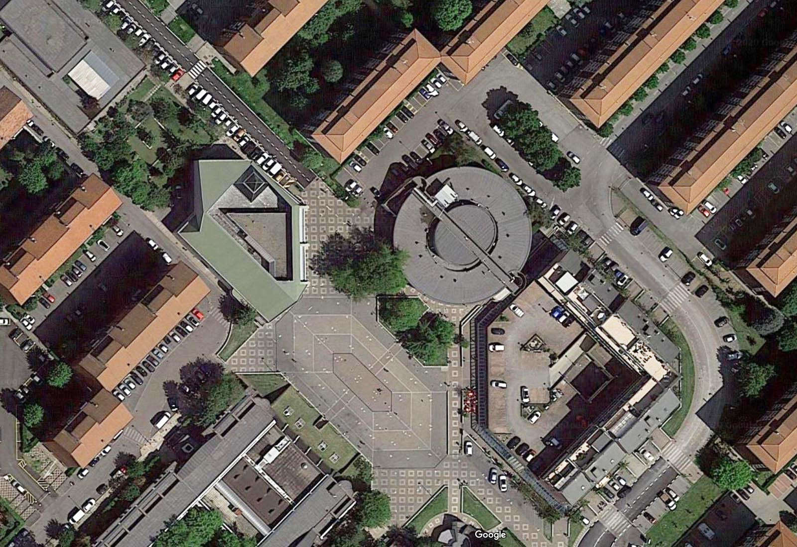 Public service building renovation in Puccini square in Pieve Emanuele - Zenithal aerial view