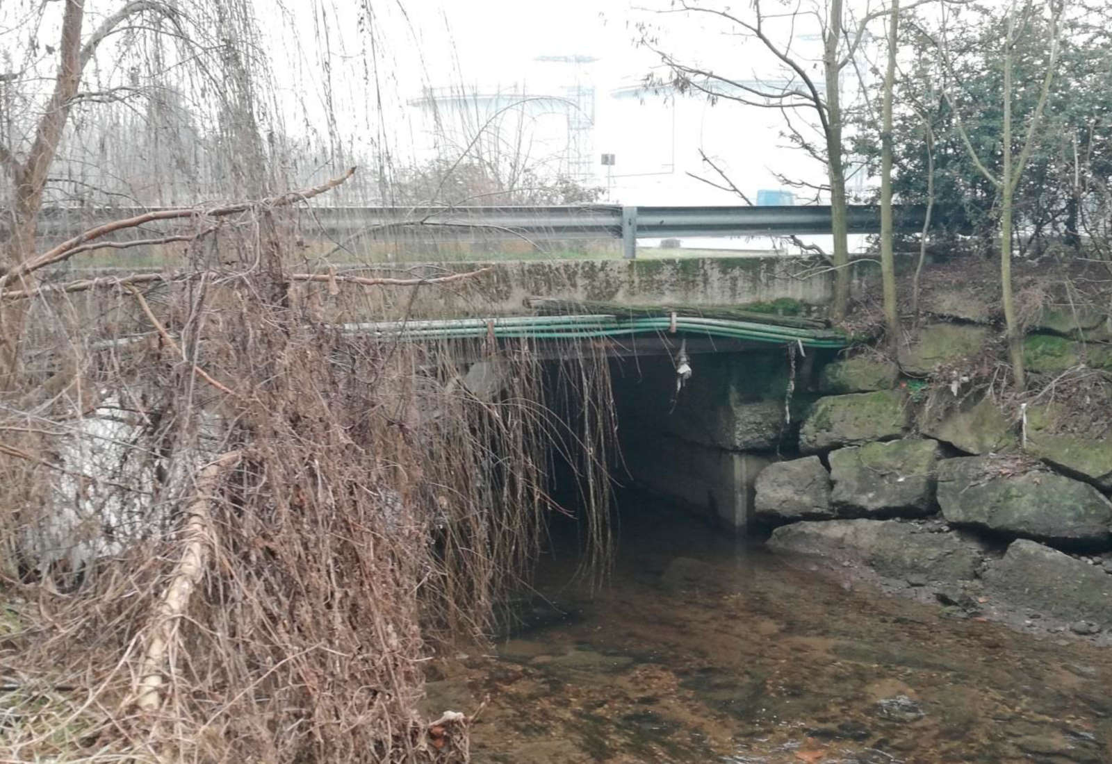 Pregnana street bridge over the Olona river in Rho - View