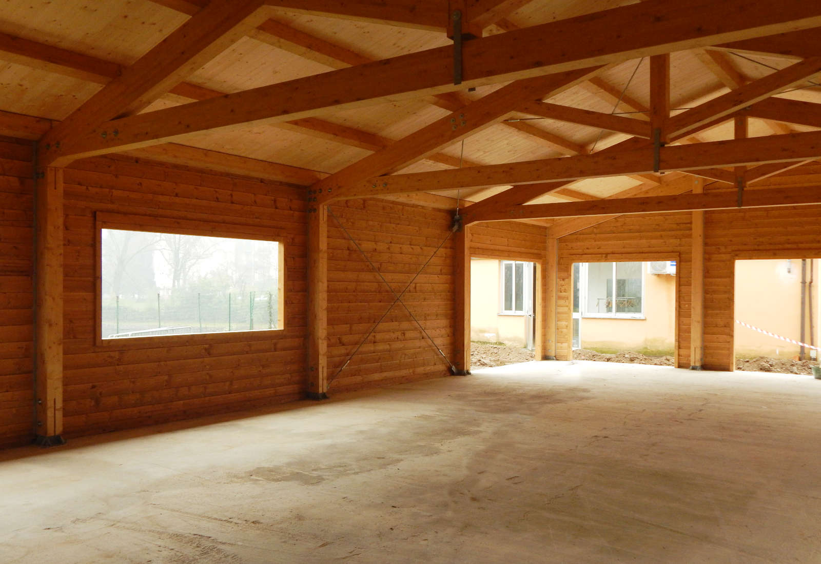 Wooden building for services in public park, Buccinasco - View